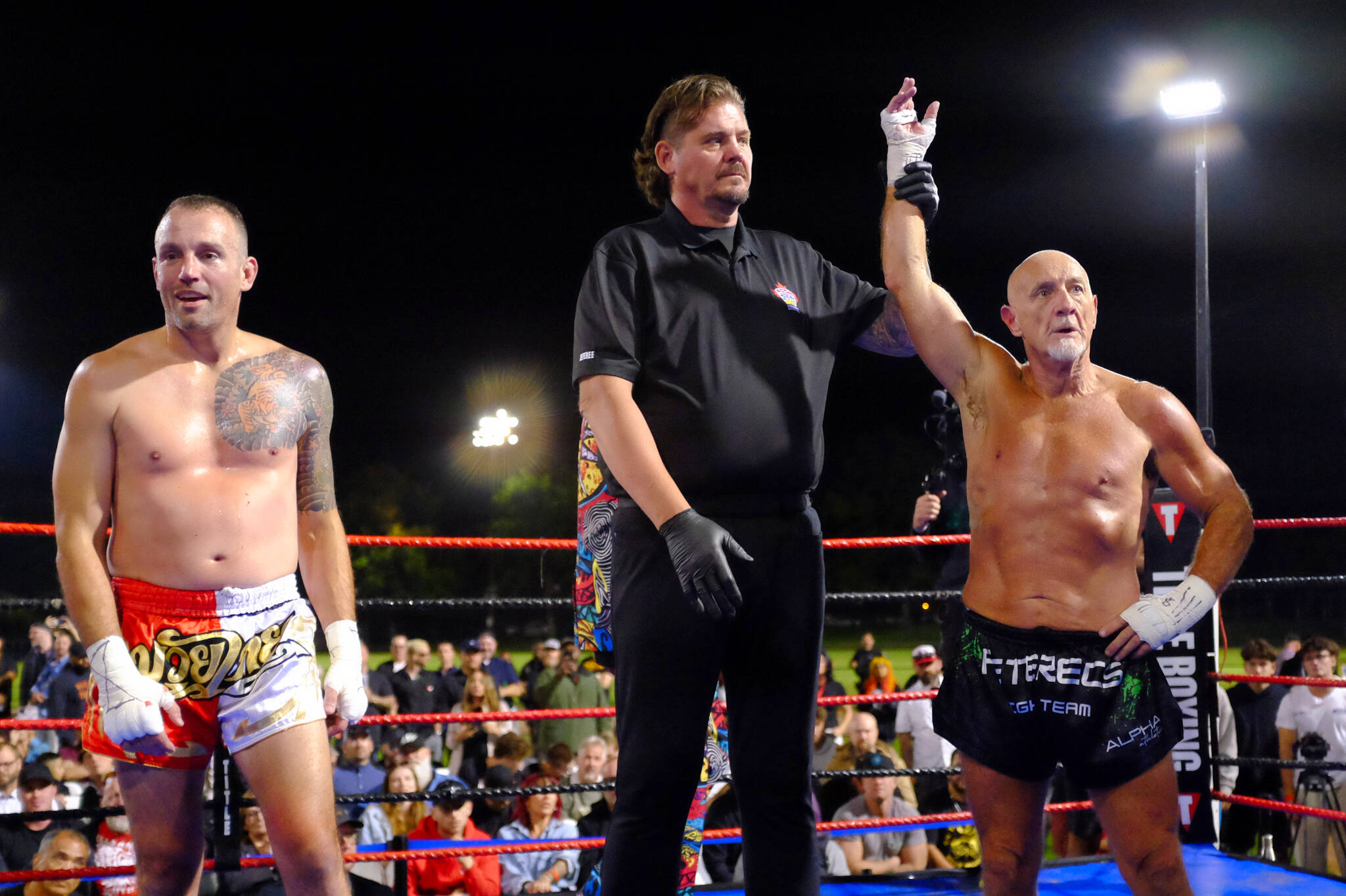 Stan Peterec (right) wins by decision at Summer Slugfest IX, held Aug. 30, 2025, at Victoria&rsquo;s Royal Athletic Park. (Olivier Laurin/Victoria News)