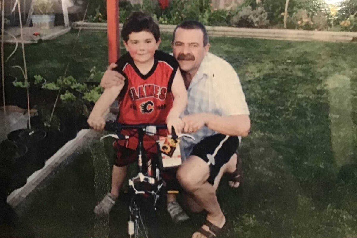 Frank Trozzo, right, with Tony&rsquo;s first bike a lifetime ago in Qualicum Beach. (Trozzo family photo)