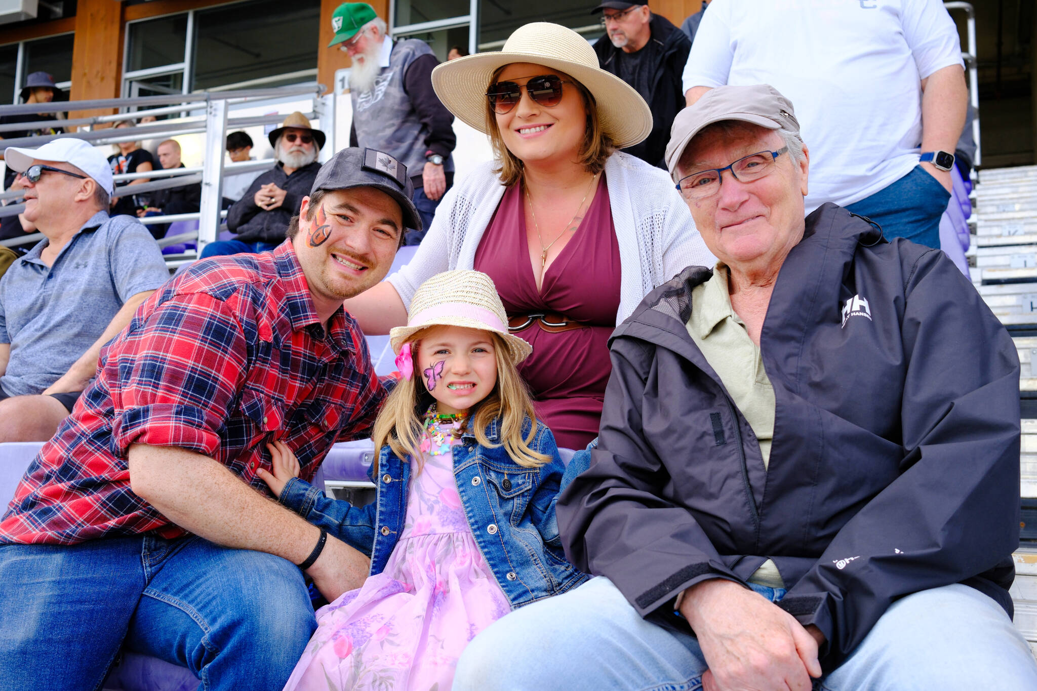 Victoria resident Zarrid Cook (left) poses with his family at the B.C. Lions pre-season game at Starlight Stadium in Langford on May 23, 2026. (Olivier Laurin/Goldstream Gazette)